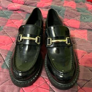 Madden Girl Shiny Black Loafers with Gold Detail